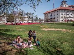 Students sitting in the Student Center Quad.