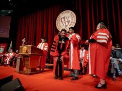 president koppell having medallion draped over his neck